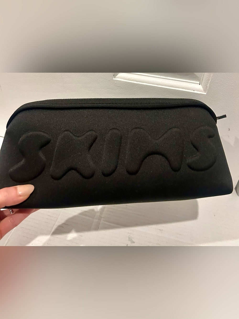 NWOT SKIMS Black Padded Cosmetic Case 5”x12”